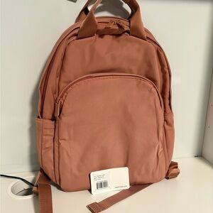 Away Featherlight Backpack in Clay Pink - Small